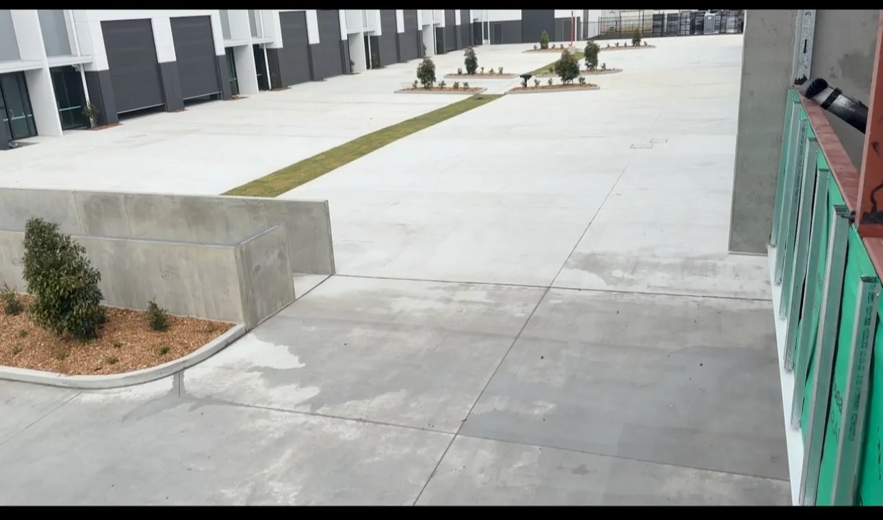 Clean forecourt and common driveway at a factory unit complex