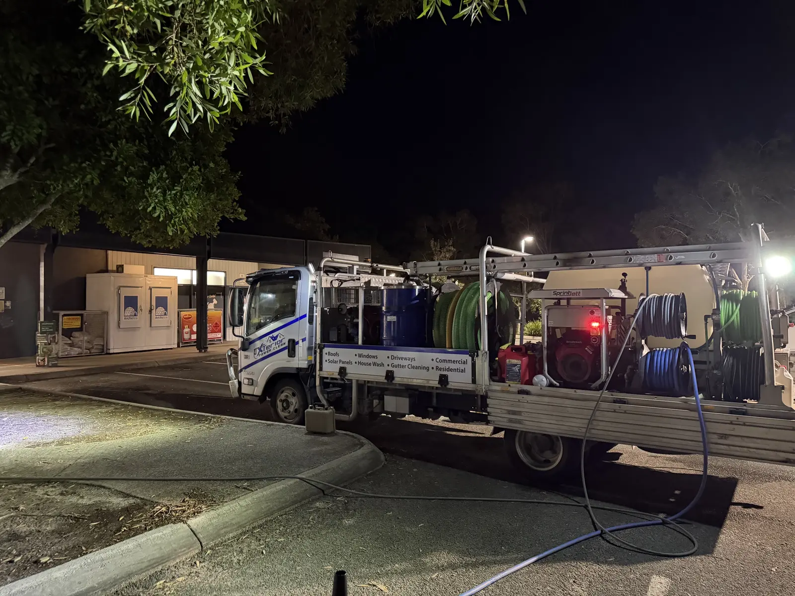 The branded Xterior Power Clean truck set up for overnight works at Sunrise Beach